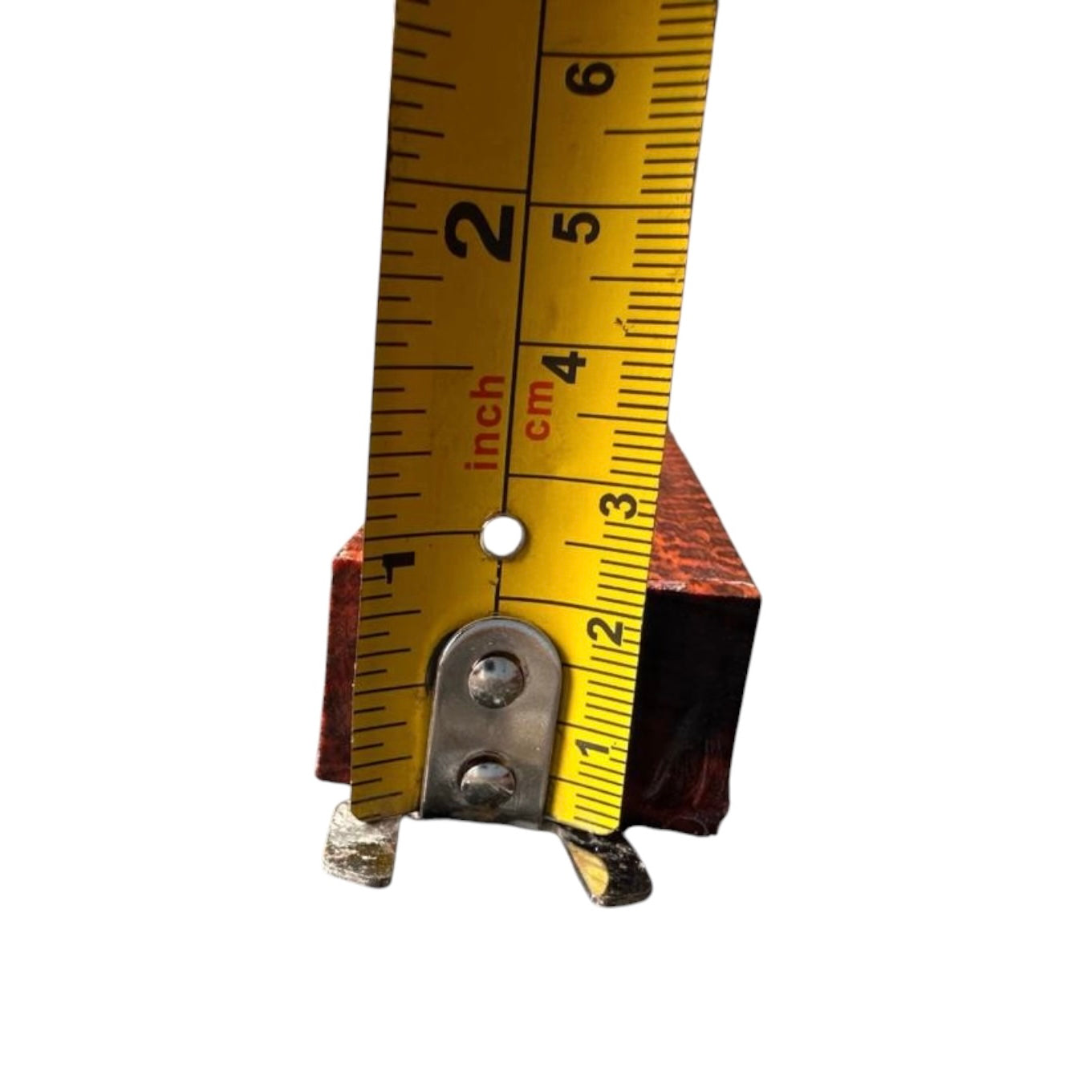 Thickness measurement of a snakewood blank showing 0.86 inches. MB010