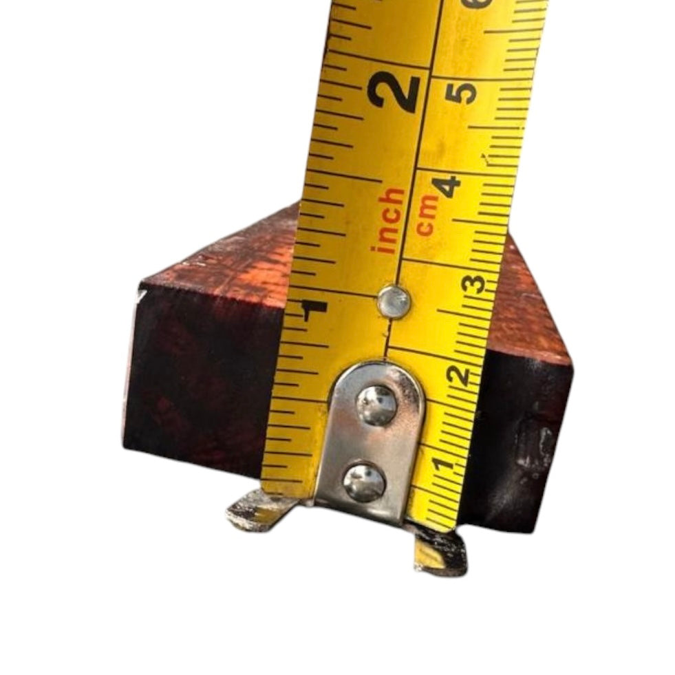 Thickness measurement of a snakewood micro lumber showing 0.90 inches. MB011