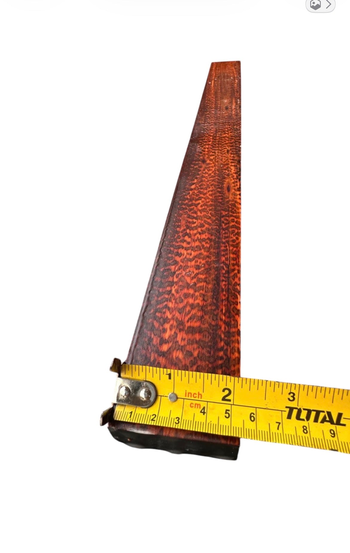 Width measurement of a snakewood micro lumber showing 2 inches. MB009