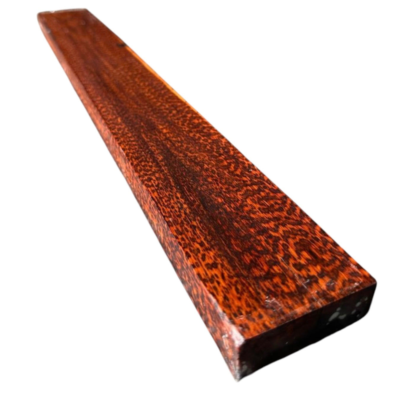 Side view 2 of a snakewood micro lumber showing natural figure. MB002